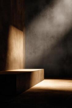 Minimalist concrete podium bathed in light against a textured wall, spotlighting form and shadow interplay. photo