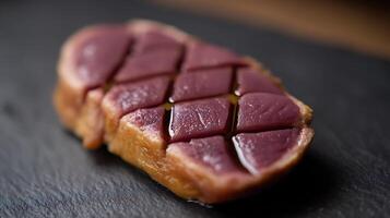 Delicious Duck Breast with Savory Glaze on Dark Slate. photo