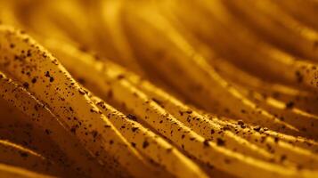 Golden Waves with Speckled Texture Reflecting Warm Light. photo