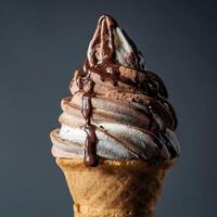 Delicious Swirl Ice Cream Cone Drizzled with Rich Chocolate Sauce. photo