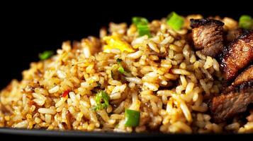 Delicious Fried Rice with Tender Meat and Green Onions. photo