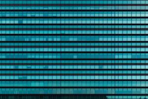 A blue building with many windows photo