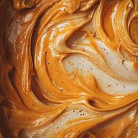 Abstract Swirls of Creamy Peanut Butter Texture. photo