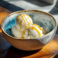 Delicious Vanilla Ice Cream Scoops with Golden Honey Drizzle. photo