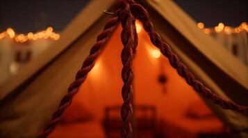 Cozy Camping Evening with Warm Lights and Twine. photo