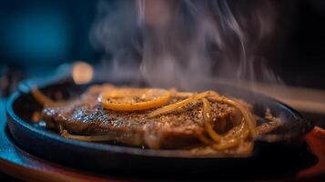 Sizzling Steak with Lemon and Onions, Steaming Hot and Delicious. photo