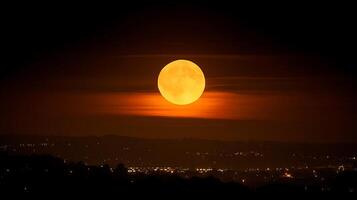 Majestic Orange Moon Rises Over A Cityscape At Dusk. photo