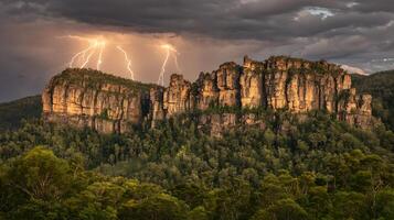 Majestic rock formations illuminated by dramatic lightning strikes during a storm. photo