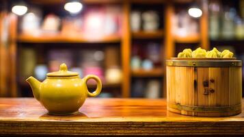Traditional Dumplings and Teapot on a Wooden Table in a Cozy Setting. photo