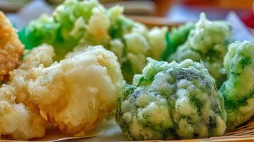 Close up of delicious crispy tempura with green vegetables and seafood. photo