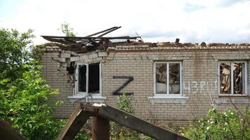View to destroye residential buildings at Kharkivska oblast. Ruined houses after bomb attacks on ukrainian territory from russia army. Consequences of russian invasion of Ukraine. Slow motion video