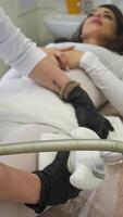 In spa, cosmetologist will use vacuum roller device equipped with manipulator to provide client with an anti-cellulite thigh massage. This helps to stimulate lymphatic drainage and accelerate metabolic processes. video