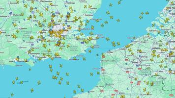 Real-Time Flight Traffic Over English Channel and Western Europe, Live map view of dense air traffic over southern UK, the English Channel, and northern France video