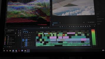 Multitrack Timeline in Editing Software with Color Grading Tools, Professional interface displays layered clips, waveforms, and color analysis for post-production video