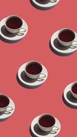 Pattern with lonely teapot and many cups of tea animated on red background. Tea mugs move in different directions. vertical footage video