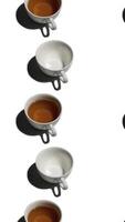 Pattern with many tea cups and empty cups animated on white background. Tea mugs with hot drink move in different directions. vertical footage video
