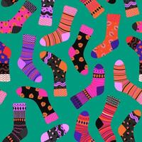 colorful patterned socks on teal background vector