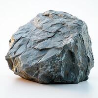 Natural stone rock with textured surface glowing softly in gentle light photo