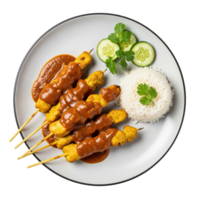 Delicious chicken satay skewers served with fluffy white rice and fresh cucumber slices on a white plate png