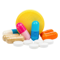Assortment of colorful medical capsules and white pills arranged together on a white surface isolated on transparent background png