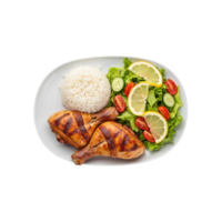 Deliciously grilled chicken drumsticks served with fluffy white rice and a fresh garden salad with lemon slices isolated on transparent background png