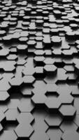 Looping animation of 3D black hexagonal tiles rising and falling in a smooth, rhythmic pattern. Futuristic and minimalistic design perfect for tech or abstract backgrounds. video