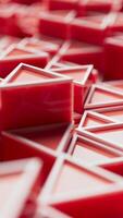 Looped animation of glossy red 3D triangles moving in a geometric pattern. Modern, abstract, and dynamic background. Perfect for tech, motion, or design themes. video