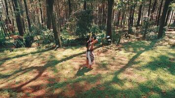 High Angle of a Javanese Archer in a Forest Clearing video