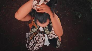 Javanese Dancer Unties Headdress in a Ritualistic Performance video