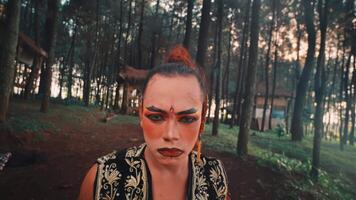 Intense Javanese Dancer Staring at Camera in the Forest video