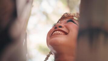 Close-up of a Laughing Javanese Dancer in a Golden Headdress video