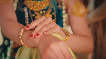 Close-up of Javanese Dancer's Hands with Red Nails video