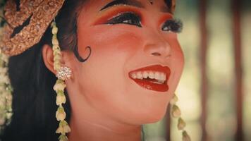 Close-up of a Joyful Javanese Dancer with a Golden Headdress video