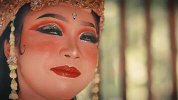 Pensive Face of a Javanese Dancer in Traditional Makeup video