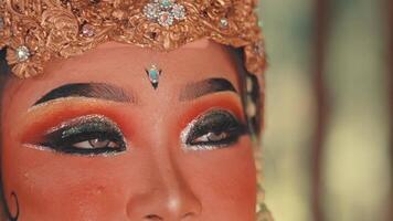 Macro Shot of a Javanese Dancer's Ornate Eye Makeup video
