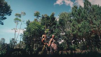 Javanese Couple in Traditional Costume Against a Blue Sky video