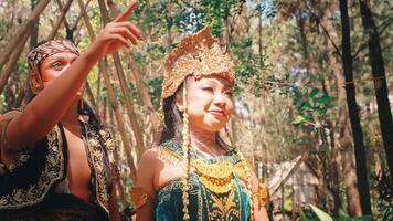Traditional Javanese Couple in a Bamboo Forest Clearing video