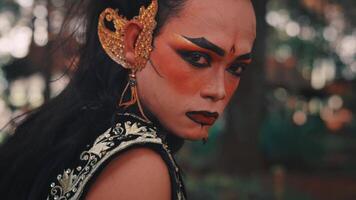 Intense Close-up of a Javanese Male Dancer with Dramatic Makeup video