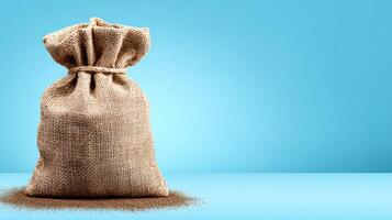 Eco-friendly Burlap Packaging on a Clear Blue Background Presents Sustainable Packaging Solutions for Various Industries photo