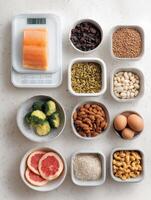 Healthy Meal Prep for Pets With Diced Ingredients and a Scale on a Light Surface During Midday photo