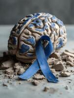 Clay Brain Visual With PTSD Awareness Ribbon Symbolizes Mental Health Challenges and Support for Individuals photo
