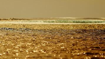Golden Ocean Waves Sparkle in Sunlight, Peaceful Seaside Ambiance. photo