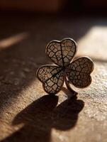 Cracked Lucky Charm Rests on Wooden Table Illuminated by Dramatic Light photo
