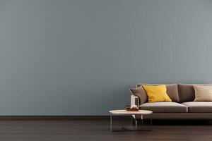 Modern living room with a comfortable sofa and a round coffee table against a muted blue wall photo