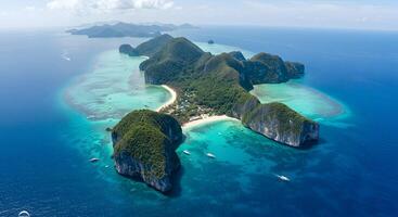 Aerial view of lush green limestone islands with white sand beaches and turquoise waters photo