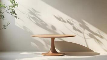 Modern wooden pedestal dining table with natural light and plant shadow casting on wall photo