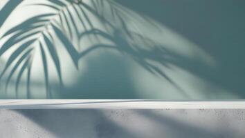 Minimalist scene with concrete podium and soft palm leaf shadows on a teal wall photo