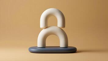 Abstract minimalist sculpture with two curved white shapes balanced on a blue oval base photo