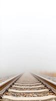 Misty Morning Railway A Serene Journey Along Vanishing Train Tracks Disappearing into a Dense Fog, Evoking Mystery and Infinite Possibilities photo