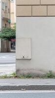 Subtle Abstract Face Emerges from a Weathered Concrete Wall, an Enigmatic Architectural Detail in a Modern Urban Streetscape. photo